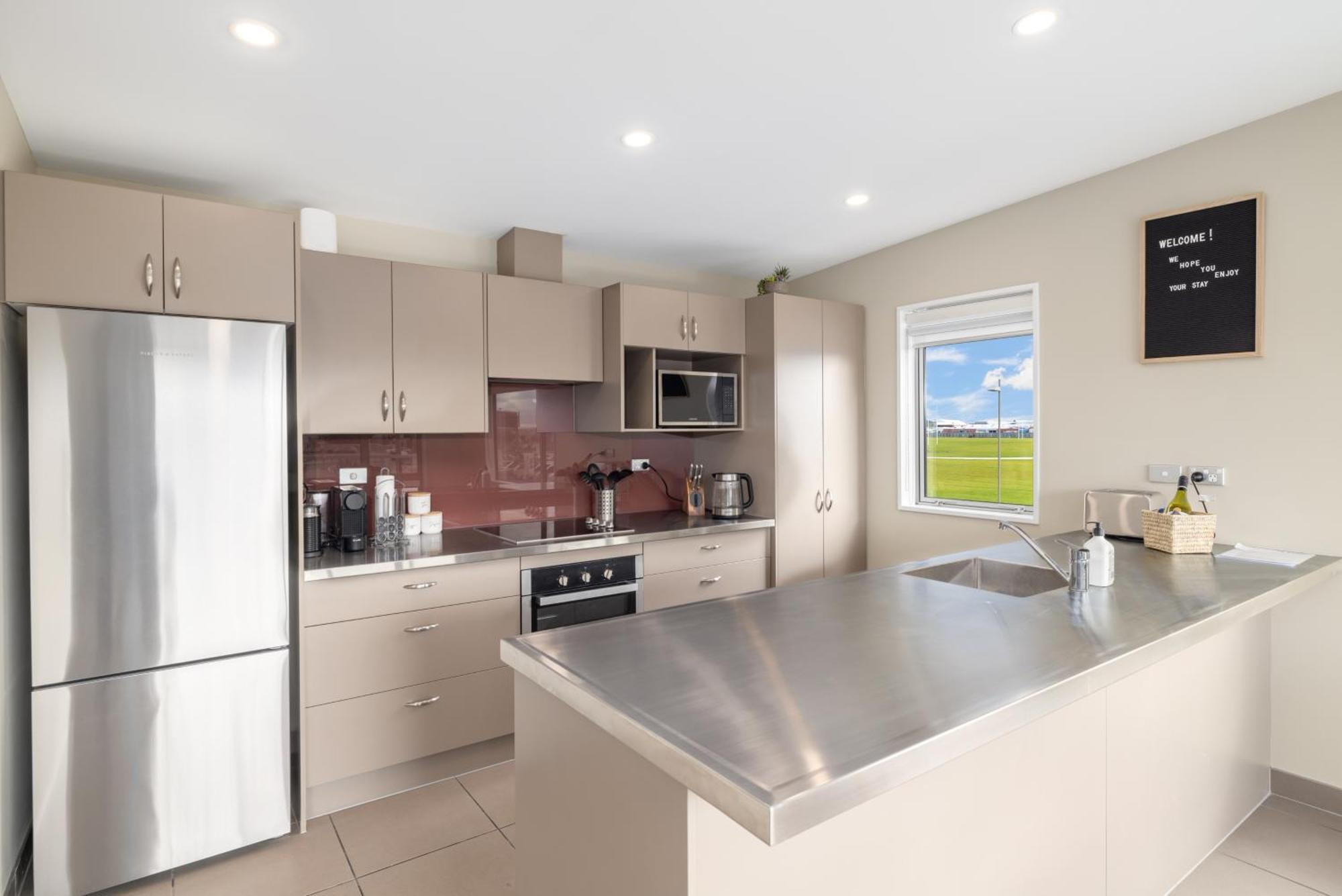 Apartment Townhouse Close To Cbd With Onsite Parking And Garaging